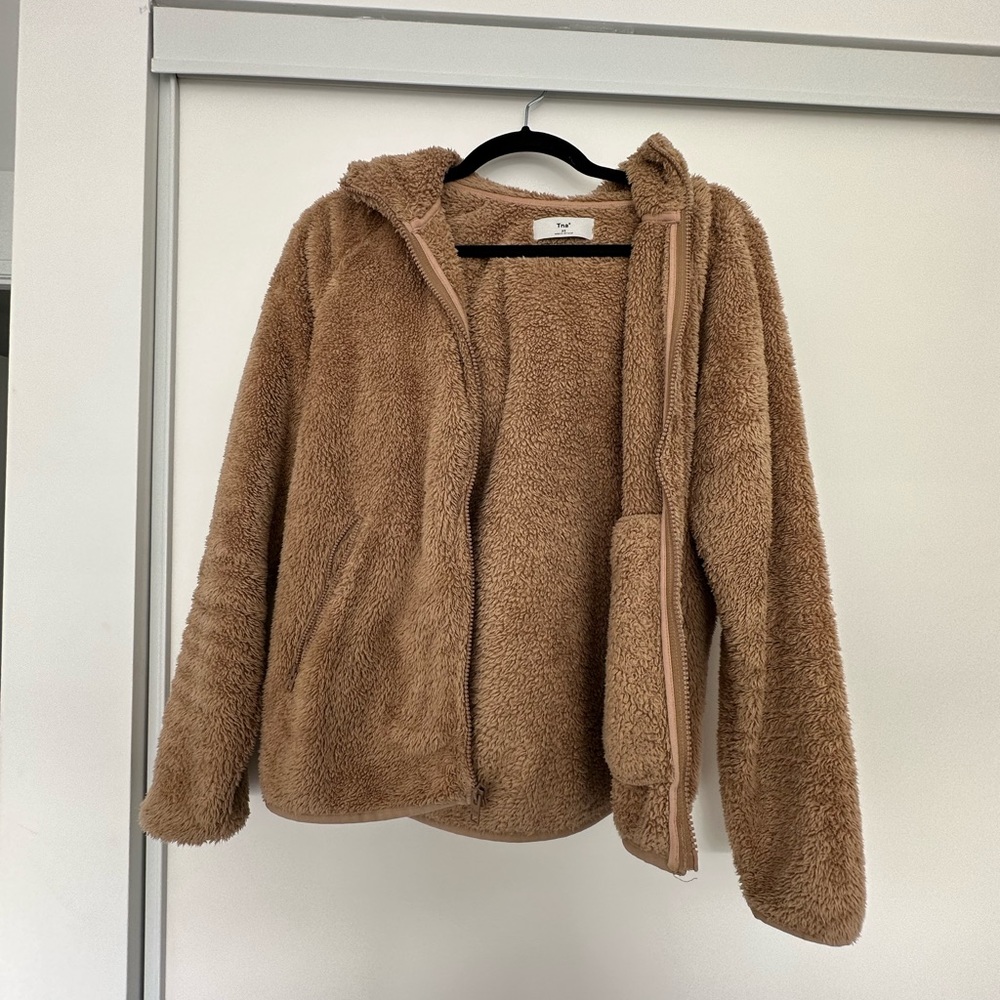 TNA fuzzy zip up. Camel color. Size XS